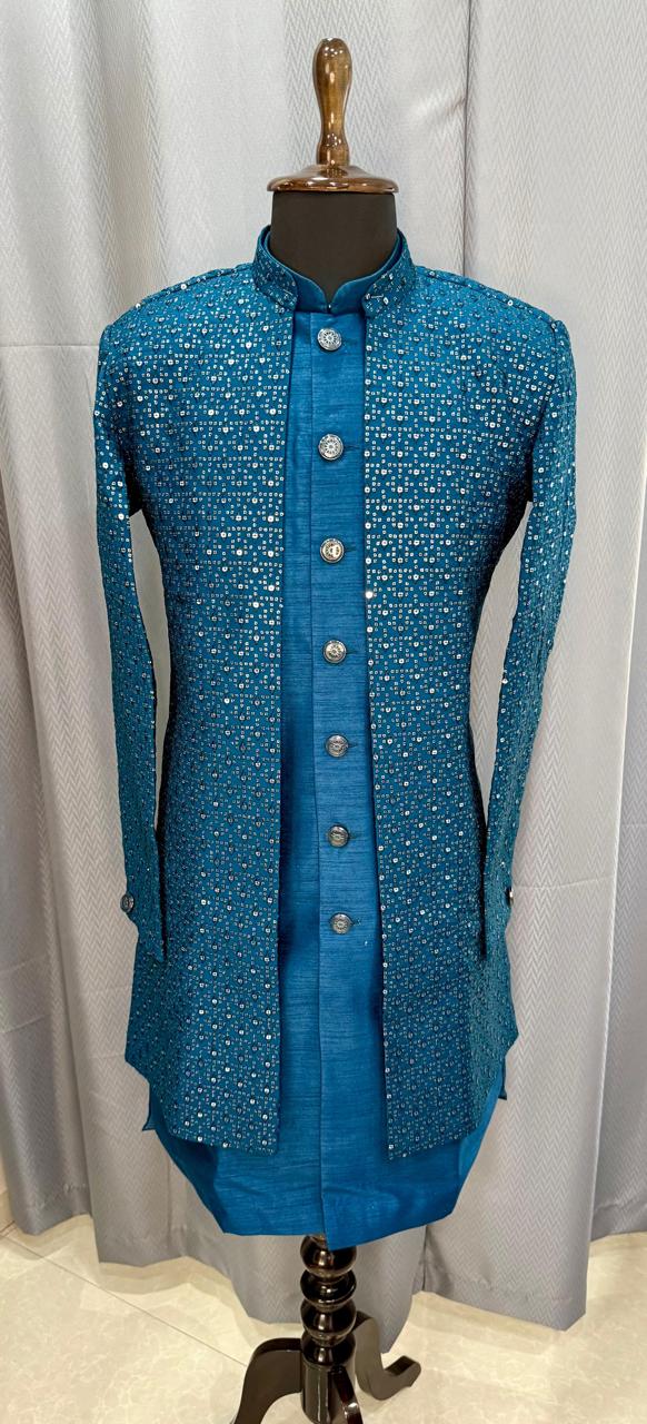 Blue embroidered open sherwani on a mannequin against a light coloured background