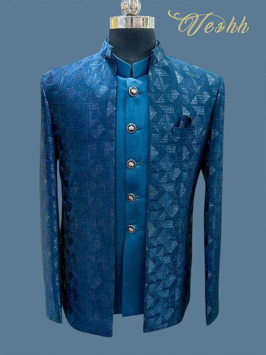 Blue patterned jacket on a mannequin with 'Veshh' branding against a blue background