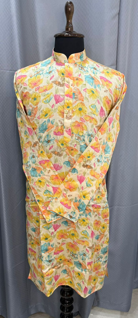 Colorful floral mens kurta on a mannequin against a gray backdrop