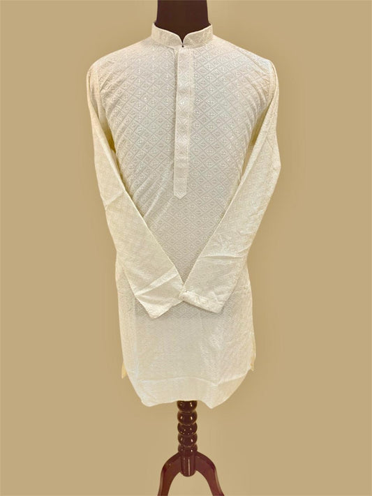 Cream traditional kurta on a mannequin against a beige background