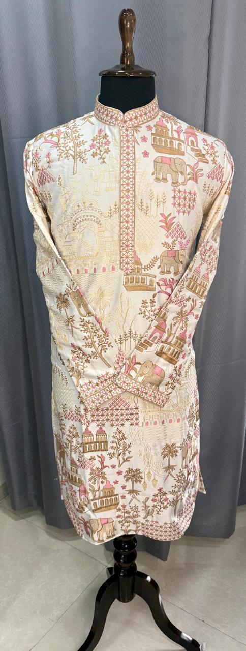 Traditional jungle themed embroidered kurta on a mannequin against a gray curtain background
