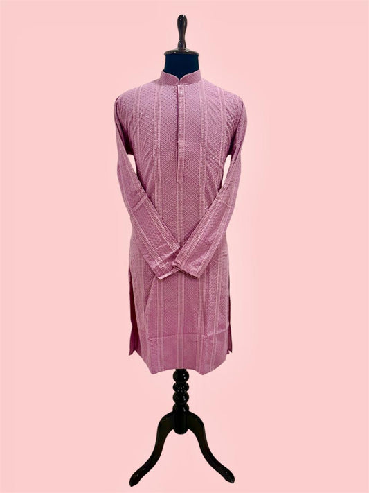 Pink kurta on a mannequin against a pink background