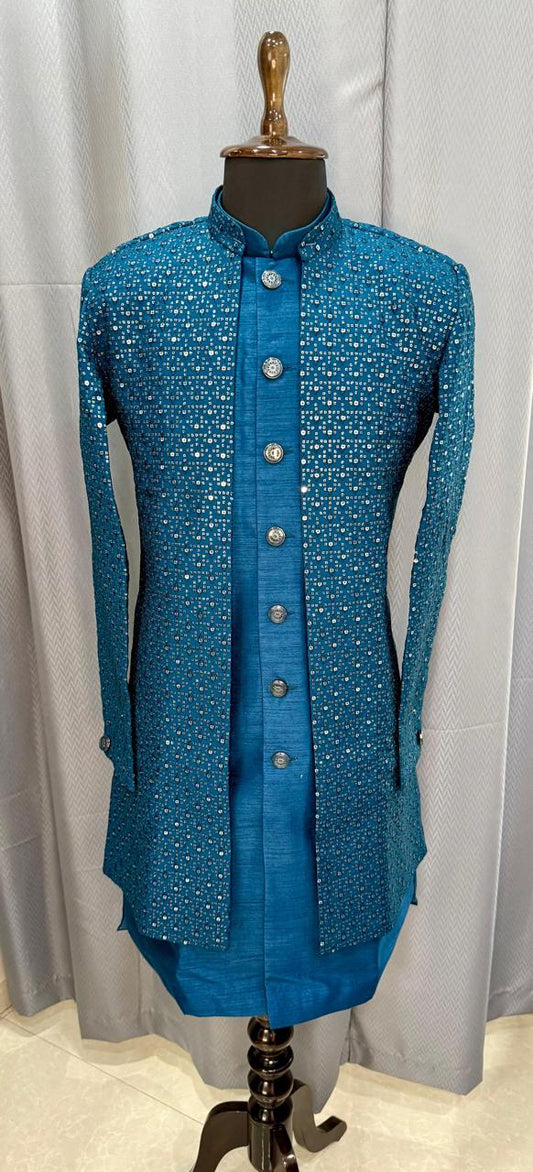 Blue embroidered open sherwani on a mannequin against a light coloured background